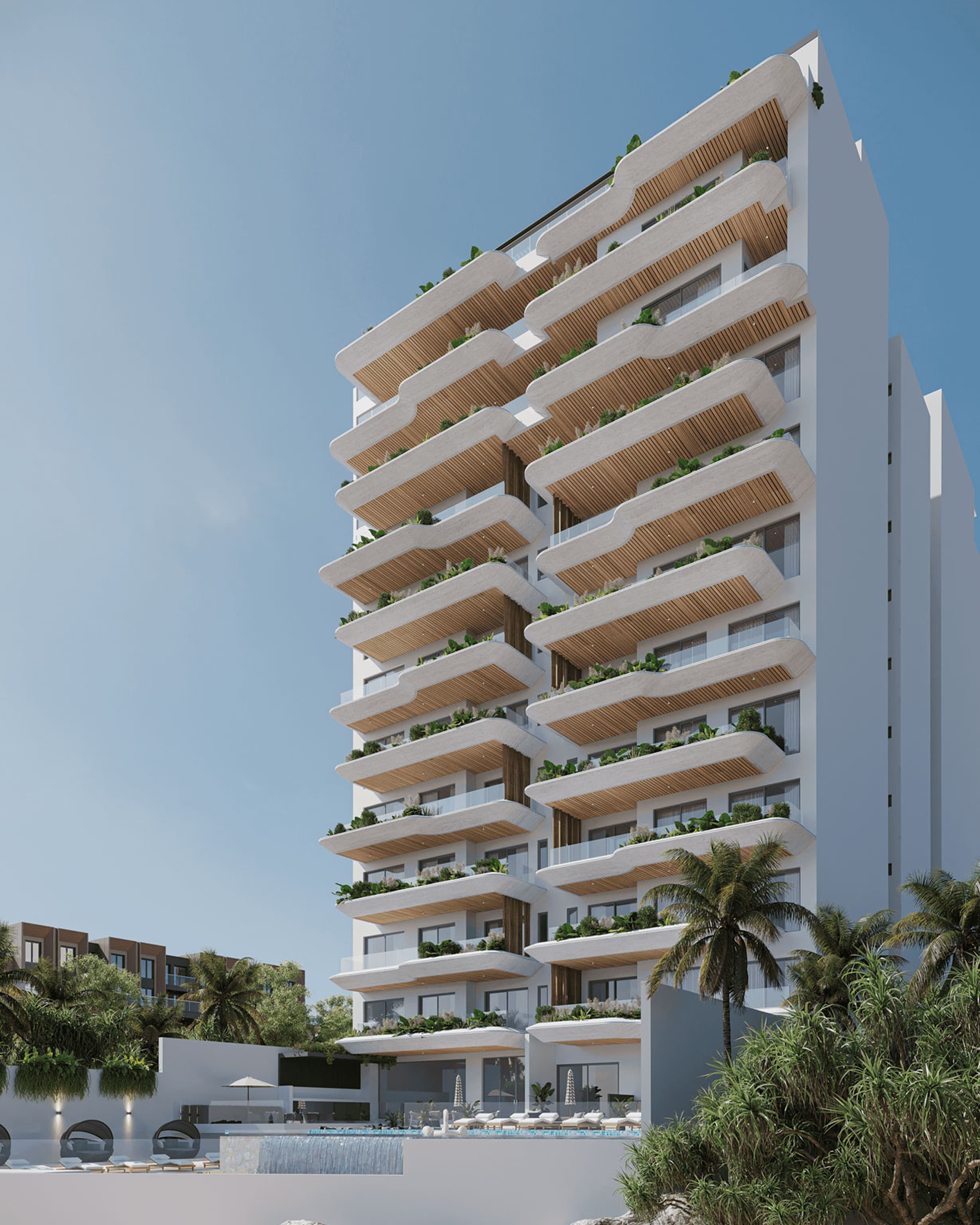 Modern apartment tower against a blue sky